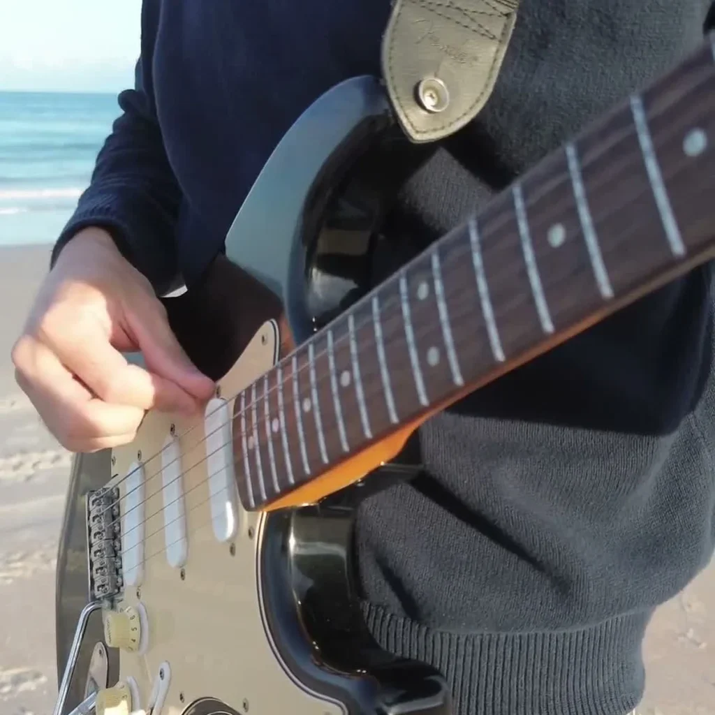 The Thrill Is Gone Guitar Loop at sunset on the beach