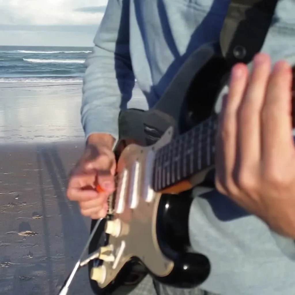 Daddy Cool Guitar Loop guitarist at the beach one guitar loop session