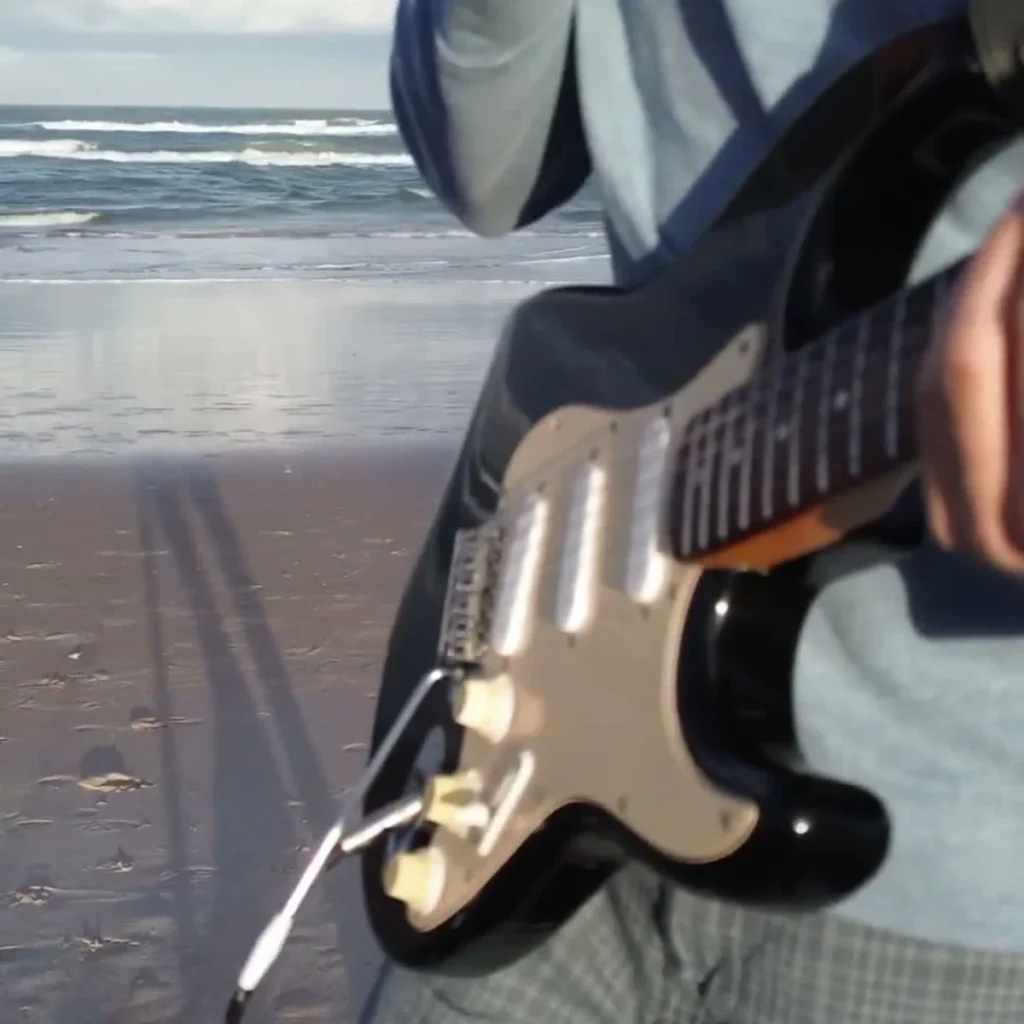 Beachside guitarist looping 'Got To Be Real' by Cheryl Lynn