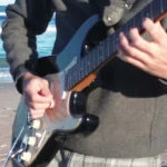 Don't Stop Til You Get Enough Guitar Loop - guitarist at the beach, one guitar loop session by the ocean